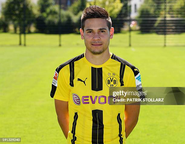 Dortmund's Portuguese defender Raphael Guerreiro poses during the team presentation of Borussia Dortmund on August 17, 2016 in Dortmund, western...