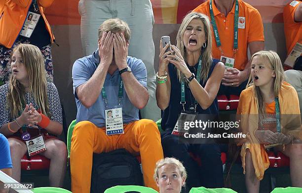 King Willem-Alexander of the Netherlands and Queen Maxima of the Netherlands react when Epke Zonderland of the Netherlands they came to support falls...