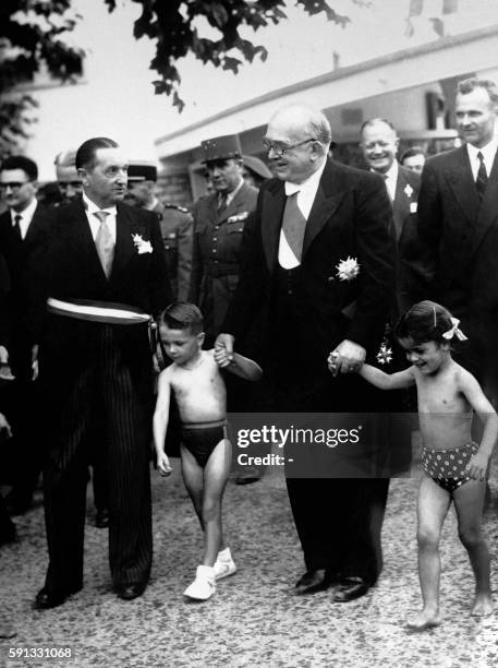 Picture released on July 5, 1953 of French president Vincent Auriol inaugurating the dam of Tignes, with mayor Michel Barrault .