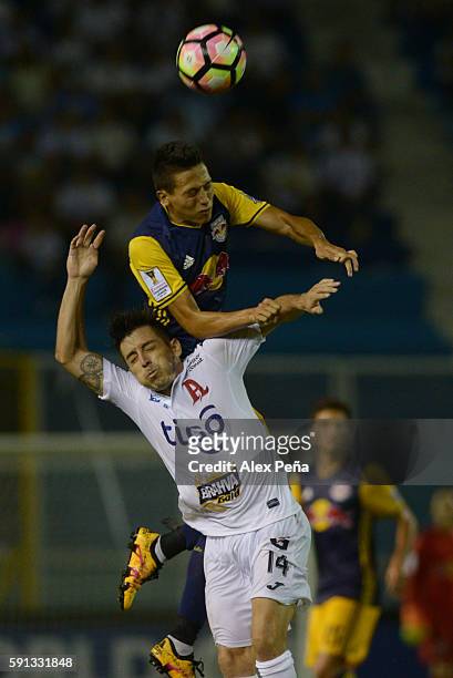 Gonzalo Veron of Red Bulls fights for the ball with Herbert Sosa of Alianza during a match between Red Bulls and Alianza as part of Liga de Campeones...