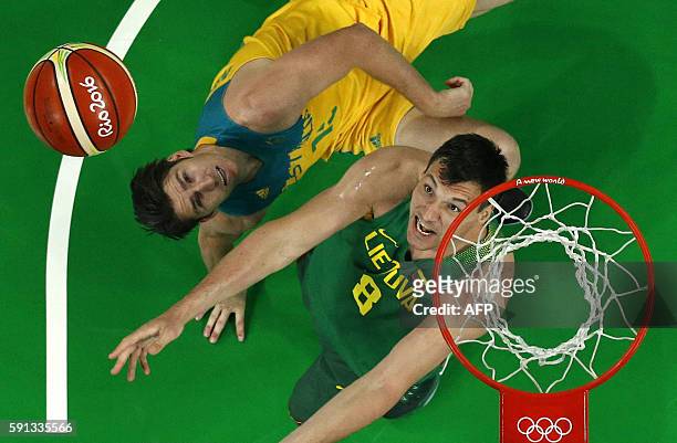 An overview shows Australia's guard Damian Martin vying with Lithuania's small forward Jonas Maciulis during a Men's quarterfinal basketball match...