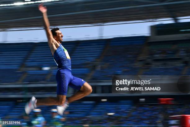 Ukraine's Oleksiy Kasyanov competes in the Men's Decathlon Long Jump during the athletics event at the Rio 2016 Olympic Games at the Olympic Stadium...
