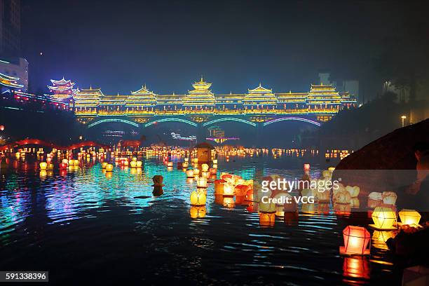 River lanterns are put in river by local people to pray for favorable weather and peaceful and prosperous country in night before the Ghost Festival...