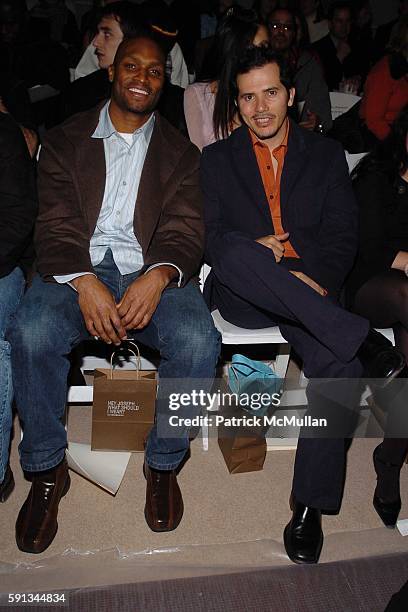Amani Toomer and John Leguizamo attend Joseph Abboud Fall 2005 Fashion Show at The Plaza Tent at Bryant Park on February 4, 2005 in New York City.
