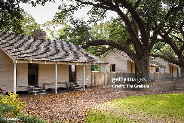 Slave quarters at Oak Alley plantation antebellum mansion house by Mississippi at Vacherie, Louisiana, USA