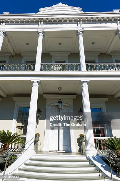 Traditional grand neo-classical mansion house with double gallery and columns in the Garden District of New Orleans, USA