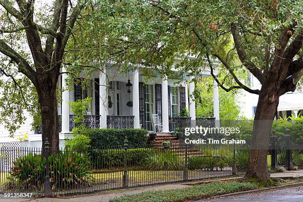 Traditional grand mansion house with columns in the Garden District of New Orleans, Louisiana, United States of America