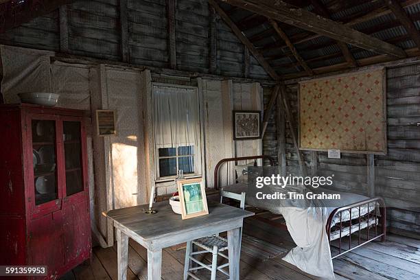 Interior of preserved slave quarters shack at cotton plantation at Frogmore Farm in Ferriday, the Deep South, Louisiana, USA