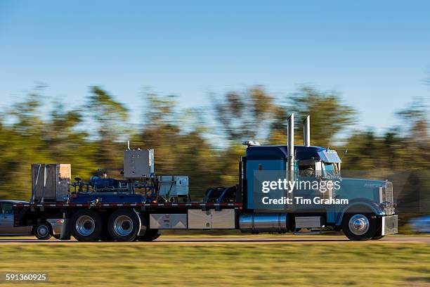 Typical clean, shiny American Freightliner truck for freight transport on trucking route Interstate 10, Louisiana, USA