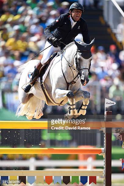 Phillipe Rozier of France rides Rahotep De Toscane during the Jumping Team Round 2 during Day 12 of the Rio 2016 Olympic Games at the Olympic...