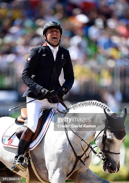 Phillipe Rozier of France reacts after riding Rahotep De Toscane during the Jumping Team Round 2 during Day 12 of the Rio 2016 Olympic Games at the...