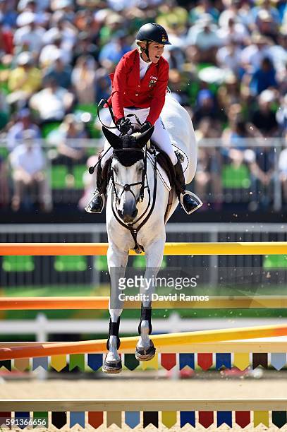 Meredith Michaels-Beerbaum of Germany rides Fibonacci during the Jumping Team Round 2 during Day 12 of the Rio 2016 Olympic Games at the Olympic...
