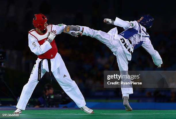 Safwan Khalil of Australia competes agains Si Mohamed Ketbi of Belgium during the Taekwondo Men's -58kg Round One contest on Day 11 of the Rio 2016...