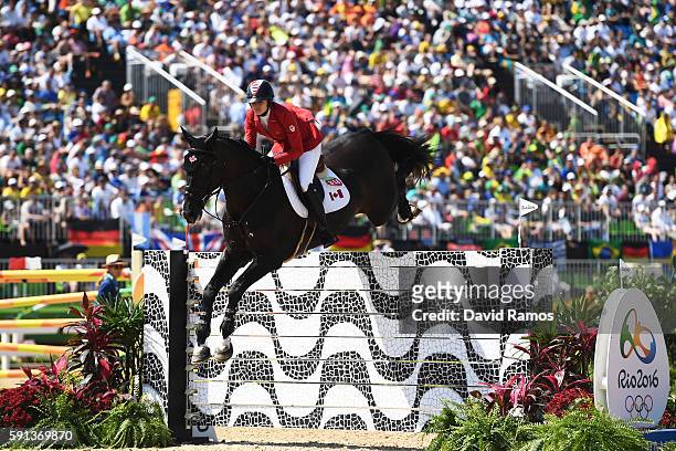 Tiffany Foster of Canada riding Tripple X III during the Jumping Team Round 2 during Day 12 of the Rio 2016 Olympic Games at the Olympic Equestrian...