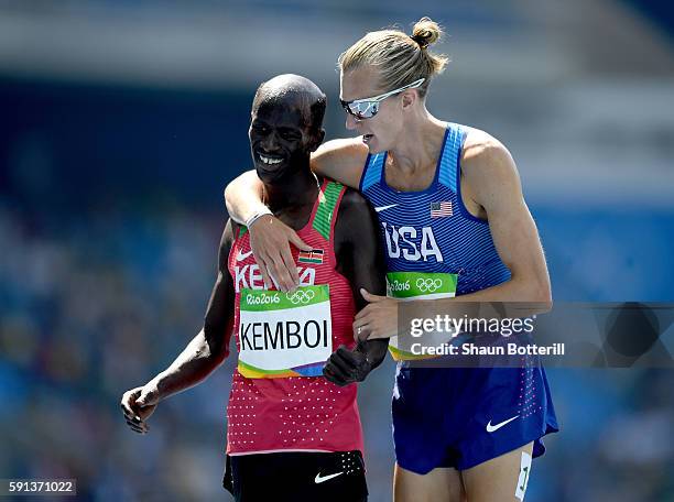 Bronze medalist Ezekiel Kemboi of Kenya and silver medalist Evan Jager of the United States celebrate after the Men's 3000m Steeplechase Final on Day...