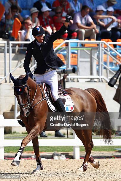 Kevin Staut of France rides Reveur de Hurtebise during the Jumping Team Round 2 on Day 12 of the Rio 2016 Olympic Games at the Olympic Equestrian...