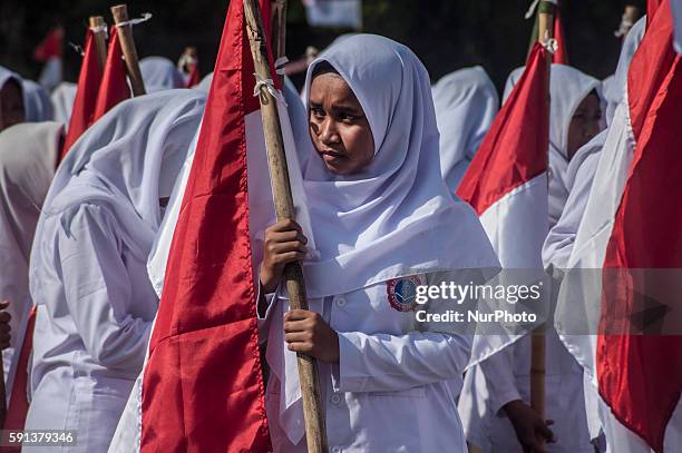 Indonesian people do ceremony in middle of the sea in beach Baron, Gunung Kidul, Yogyakarta, Indonesia, on August 17, 2016. About 350 Indonesian...