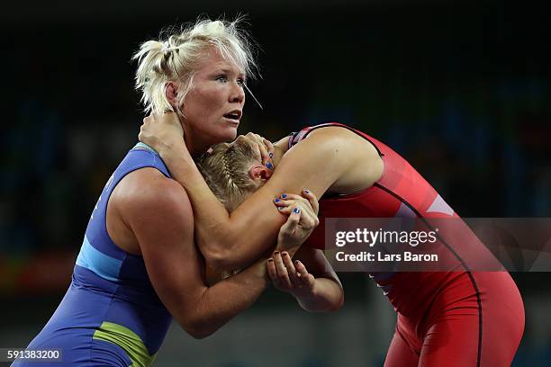 Anna Jenny Fransson of Sweden competes against Aline Focken of Germany during a Women's Freestyle 69kg Quarterfinal bout on Day 12 of the Rio 2016...