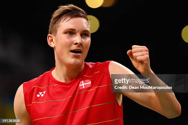 Viktor Axelsen of Denmark reacts after defeating Rajiv Ouseph of Great Britain during the Men's Singles Quarterfinal Badminton match on Day 12 of the...