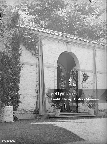 North entrance of patio at Charles B Pike residence at 955 North Lake Road, Lake Forest, Illinois, 1920s or 1930s.