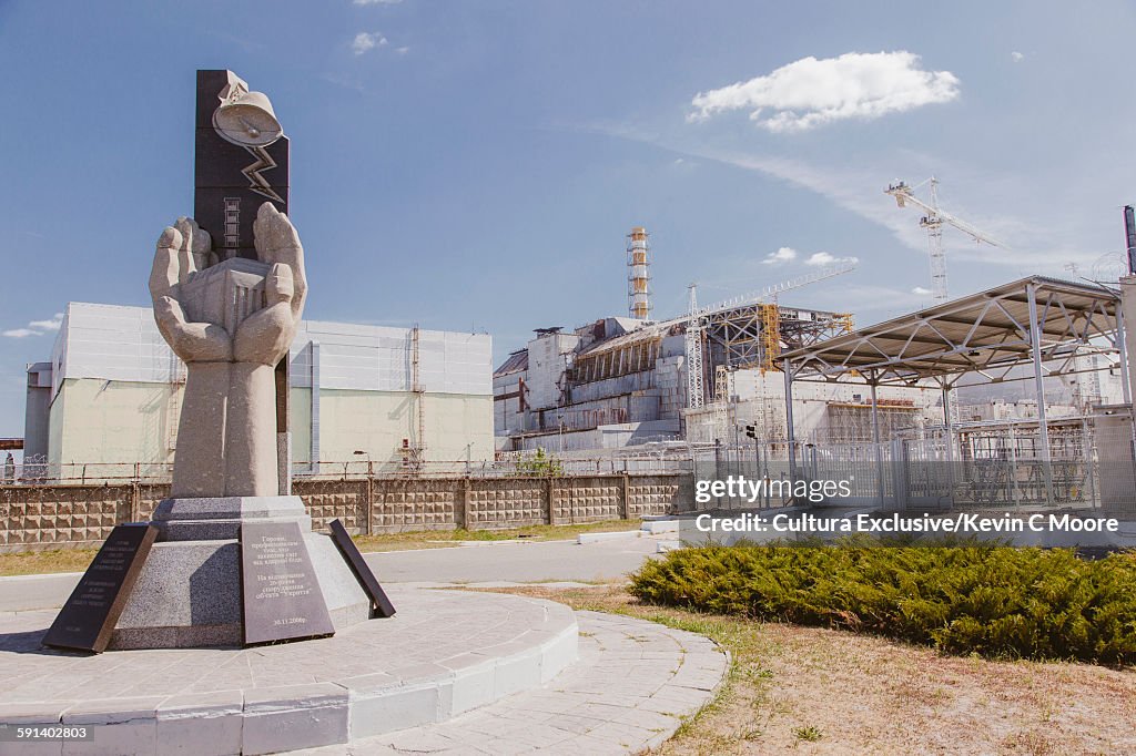 Monument in front of Chernobyl nuclear reactor in the Chernobyl Exclusion Zone, Ukraine
