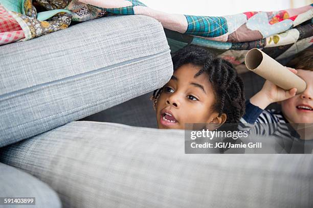 boys playing in pillow fort - fort stock pictures, royalty-free photos & images