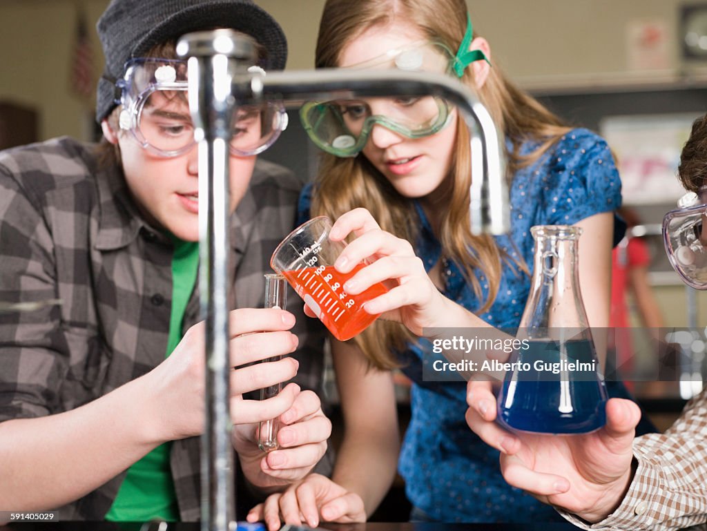 Students Performing Experiment In Science Lab Classroom Photo - Getty ...