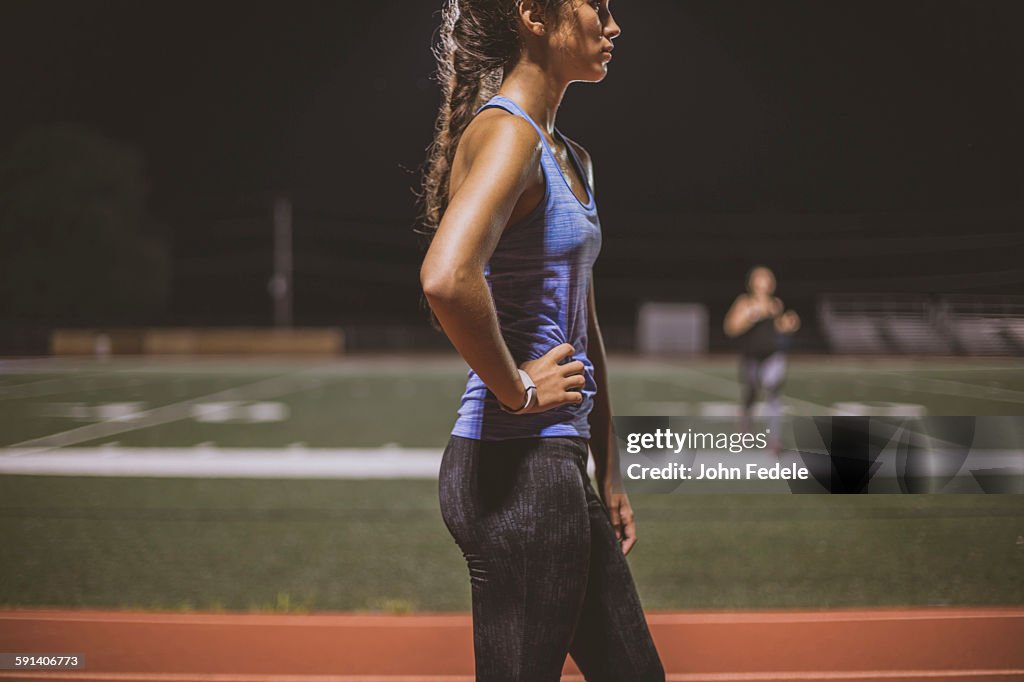 Athlete resting on sports field