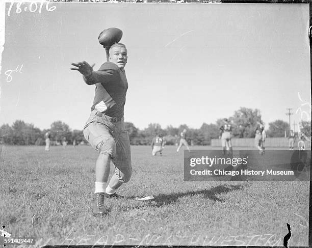 Don Heap, football player for Northwestern University, throwing a football, Chicago, Illinois, September 1935.