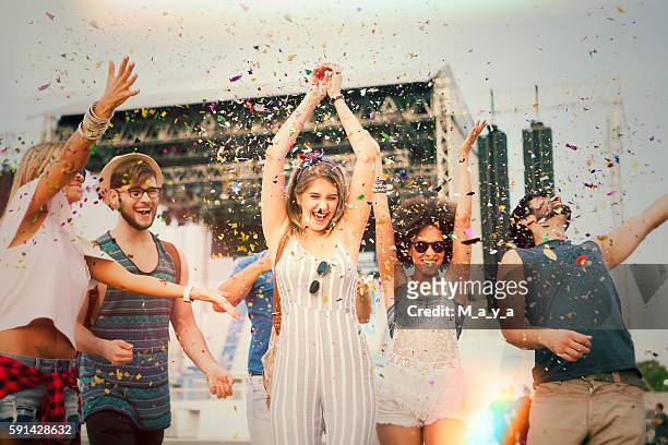 having fun at concert. - music festival stock pictures, royalty-free photos & images