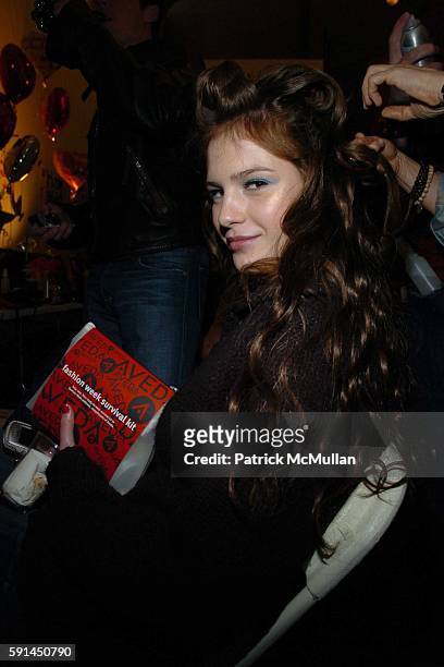 Model holding the Aveda Fashion Week Survival Kit attends Betsey Johnson Fall 2005 Fashion Show at The Plaza at Bryant Park on February 7, 2005 in...