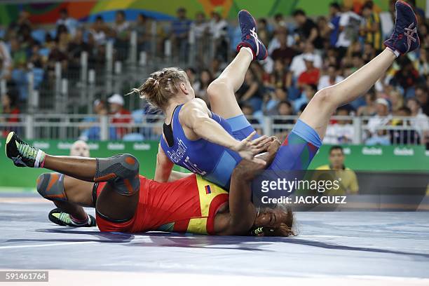 Colombia's Jackeline Renteria Castillo competes with Azerbaijan's Yuliya Ratkevich during the women's wrestling 58kg freestyle quarter-final at the...