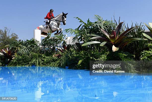 Meredith Michaels-Beerbaum of Germany riding Fibonacci competes during the Jumping Team competition on Day 12 of the Rio 2016 Olympic Games at the...