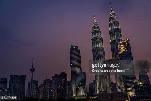 kuala lumpur skylines at dawn - skybridge petronas twin towers stock pictures, royalty-free photos & images