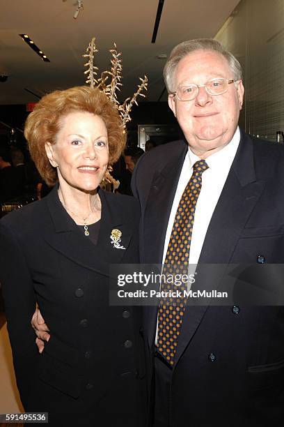 Pauline Mouw and Jacques Mouw attend Distinction Holiday Party hosted by De Beers for AMFAR at De Beers Store on December 5, 2005.