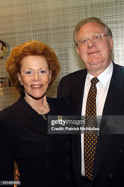 Pauline Mouw and Jacques Mouw attend Distinction Holiday Party hosted by De Beers for AMFAR at De Beers Store on December 5, 2005.