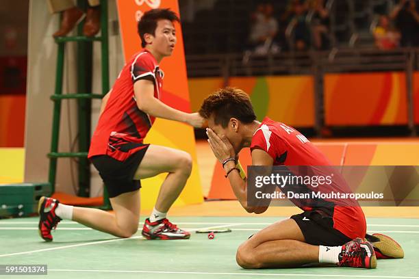Gold medalists, Tontowi Ahmad and Liliyana Natsir of Indonesia celebrate after the Mixed Doubles Gold Medal Match on Day 12 of the Rio 2016 Olympic...