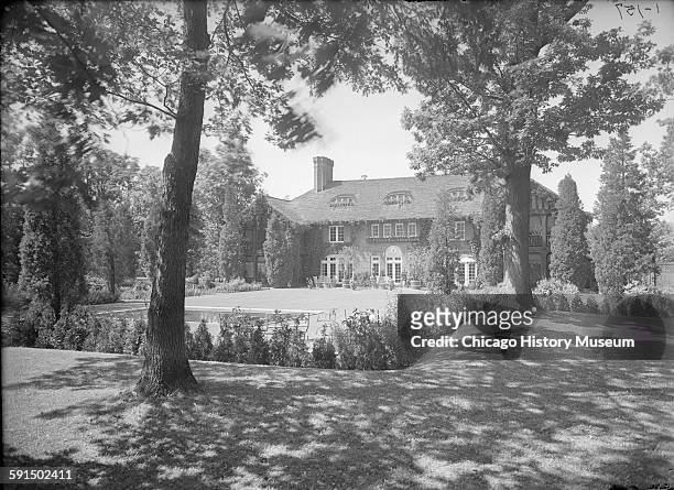 South view of Mrs Laurance Armour residence at 395 North Green Bay Road, Lake Forest, Illinois, 1920s or 1930s. In 1987, the estate became the center...