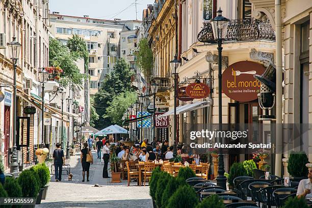 street cafes in bucharest old town - bucharest stock pictures, royalty-free photos & images