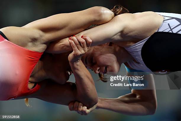 Marwa Amri of Tunisia competes against Elif Jale Yesilirmak of Turkey during a Women's Freestyle 58kg Repechage Round 2 bout on Day 12 of the Rio...