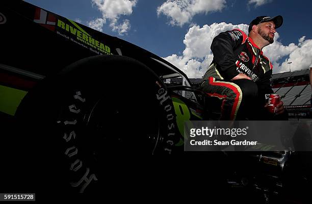 Eric Goodale, driver of the GAF Roofing/RBSCorp.com Chevrolet, sits on the grid during qualifying for the NASCAR Whelen Modified Tours Bush's Beans...