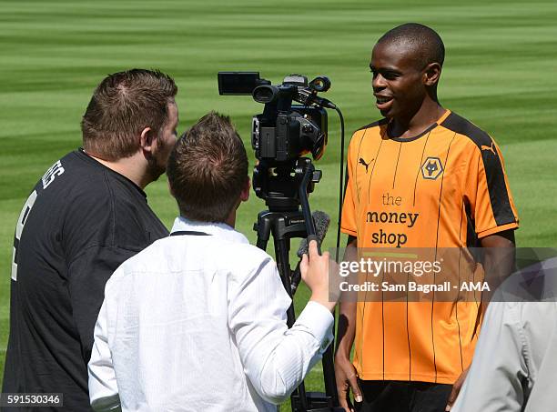 Prince Oniangue signs for Wolverhampton Wanderers on August 15, 2016 in Wolverhampton, England.