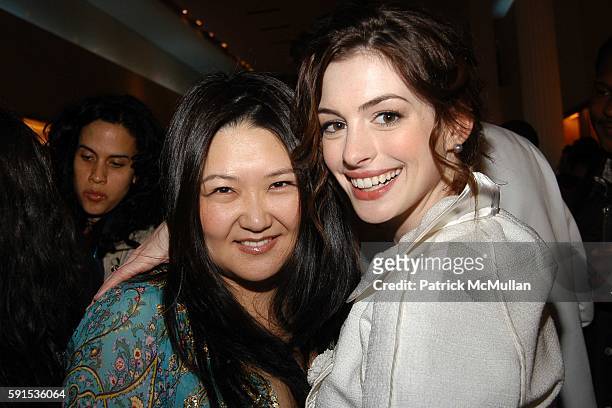 Susan Shin and Anne Hathaway attend LOUIS VUITTON & INTERVIEW MAGAZINE Party for Pharrell Williams and Nigo at Louis Vuitton in Soho on May 24, 2005...