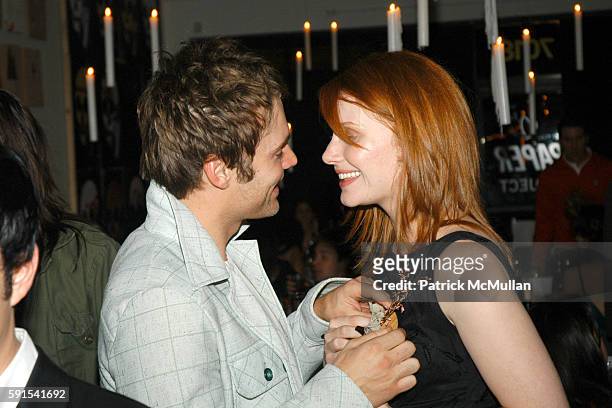 Seth Gabel and Bryce Dallas Howard attend Paper Magazine's Last Supper Party sponsored by FATBURGER at Acme on December 11, 2005.