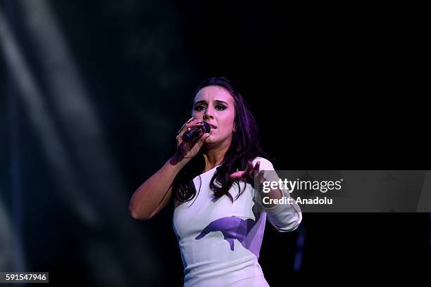 Crimean Tatar-Turk singer Jamala, represented Ukraine in 2016 Eurovision song contest, performs during a concert in Istanbul, Turkey on August 17,...