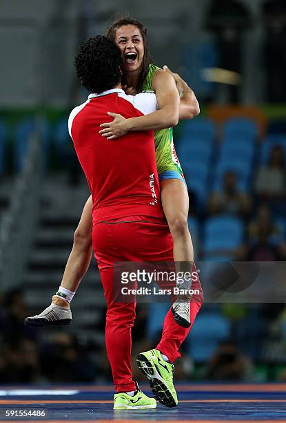 Elitsa Atanasova Yankova of Bulgaria celebrates winning bronze against Patricia Alejandra Bermudez of Argentina in the Women's Freestyle 48kg event...