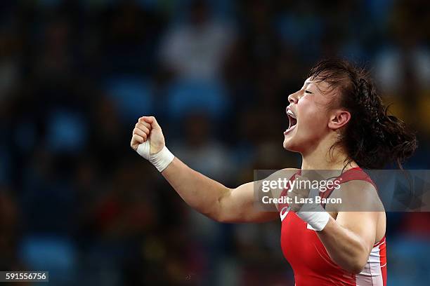 Eri Tosaka of Japan celebrates winning gold against Mariya Stadnik of Azerbaijan in the Women's Freestyle 48kg event on Day 12 of the Rio 2016...
