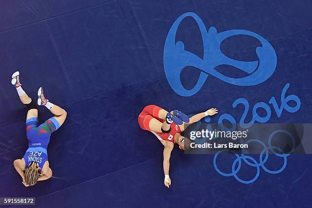 Eri Tosaka of Japan celebrates winning gold against Mariya Stadnik of Azerbaijan in the Women's Freestyle 48kg event on Day 12 of the Rio 2016...