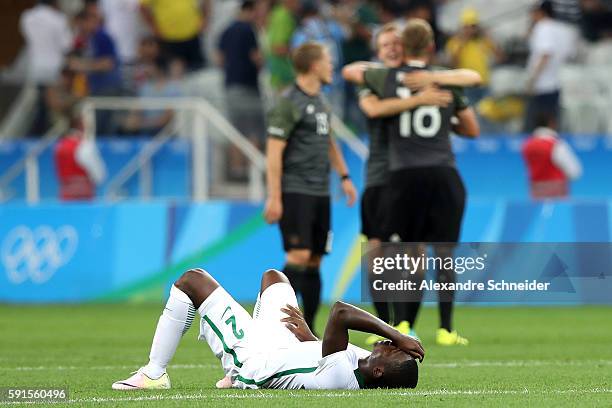 Muenfuh Sincere of Nigeria lays on the ground after losing the Men's Semifinal Football match between Nigeria and Germany on Day 12 of the Rio 2016...