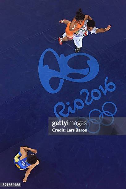 Sakshi Malik of India celebrates after defeating Aisuluu Tynybekova of Kyrgyzstan during the Women's Freestyle 58 kg Bronze match on Day 12 of the...